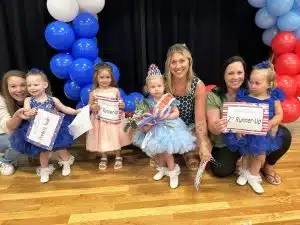 Miss Jamboree Pageant Winners in the girls 25 to 48 months category: Queen Indy Williams (2nd from right) 28 month old daughter of Brian and Stephanie Williams of Smithville. She also won for Prettiest Attire, Most Photogenic, and Peoples Choice. First runner-up Enleigh Brooke Phillips (2nd from left) 40 month old daughter of Kyle and MaKenzi Phillips of Dowelltown. Her optional award was for Prettiest Hair. Jacee Martin was second runner-up (far right). She is 2-year-old daughter of Ashley and Gaven of Dowelltown. Corie Rae Smith (far left) 28 month old daughter of Jesse and Chloe Smith of Smithville received optional awards for Prettiest Eyes and Smile.