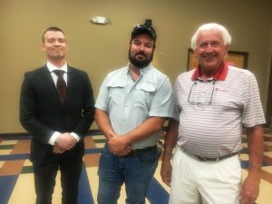 Davey Horton (Center) Hired as County's First Part Time Certified Building Codes Inspector. Pictured with County Mayor Matt Adcock and County Commissioner Larry Green