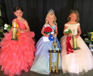 DeKalb Fair Little Miss Livy Hollis Slager (center); First runner-up Anna Lee Brelje (right); and Second Runner-up Oaklynn Grace Ferrell (left)