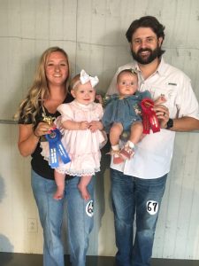 DeKalb Fair Baby Show: *Girls (7-9 months) Winner: Eliza Beth Burke (left), seven month old daughter of Jonah and Kelsey Burke of Smithville. Runner-up: Mabel Jean Martin (right), eight month old daughter of Zack and Chandler Martin of Alexandria.