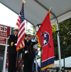 Deputy Chief Jeff Wright and Captain John Poss of the Smithville Fire Department posted colors during the opening ceremony of the Fiddlers Jamboree Friday evening