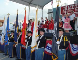 The Smithville Community Chorus pays tribute to veterans during the opening ceremony of the Fiddlers Jamboree Friday evening