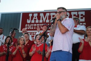 Tony Luna plays harmonica in tribute to Grand Ole Opry pioneer DeFord Bailey during Community Chorus program at the Jamboree Friday evening